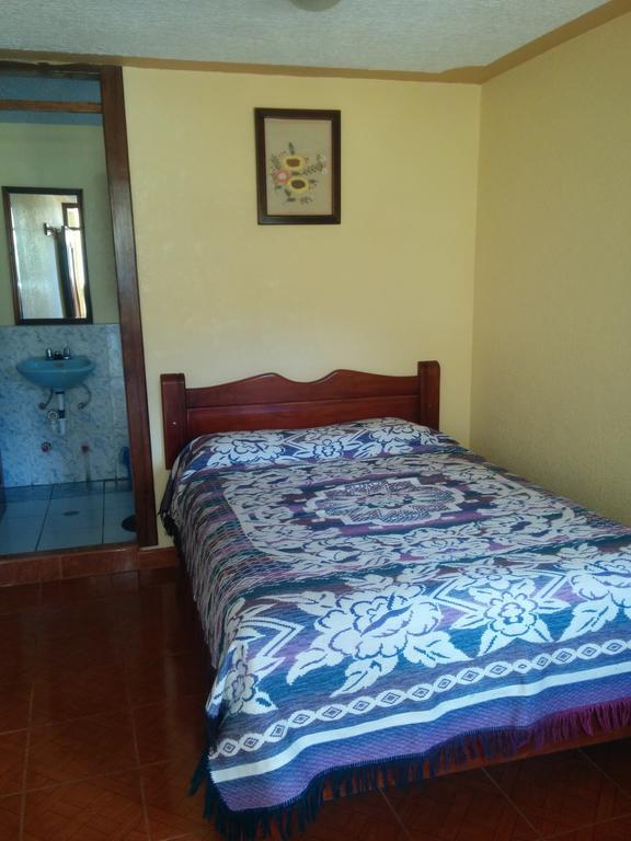 אוטהוואלו Hostal Curinan חדר תמונה
